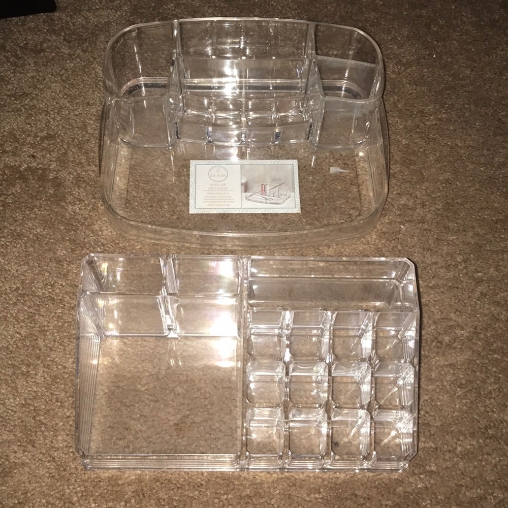 Plastic makeup holders. Both brand new!